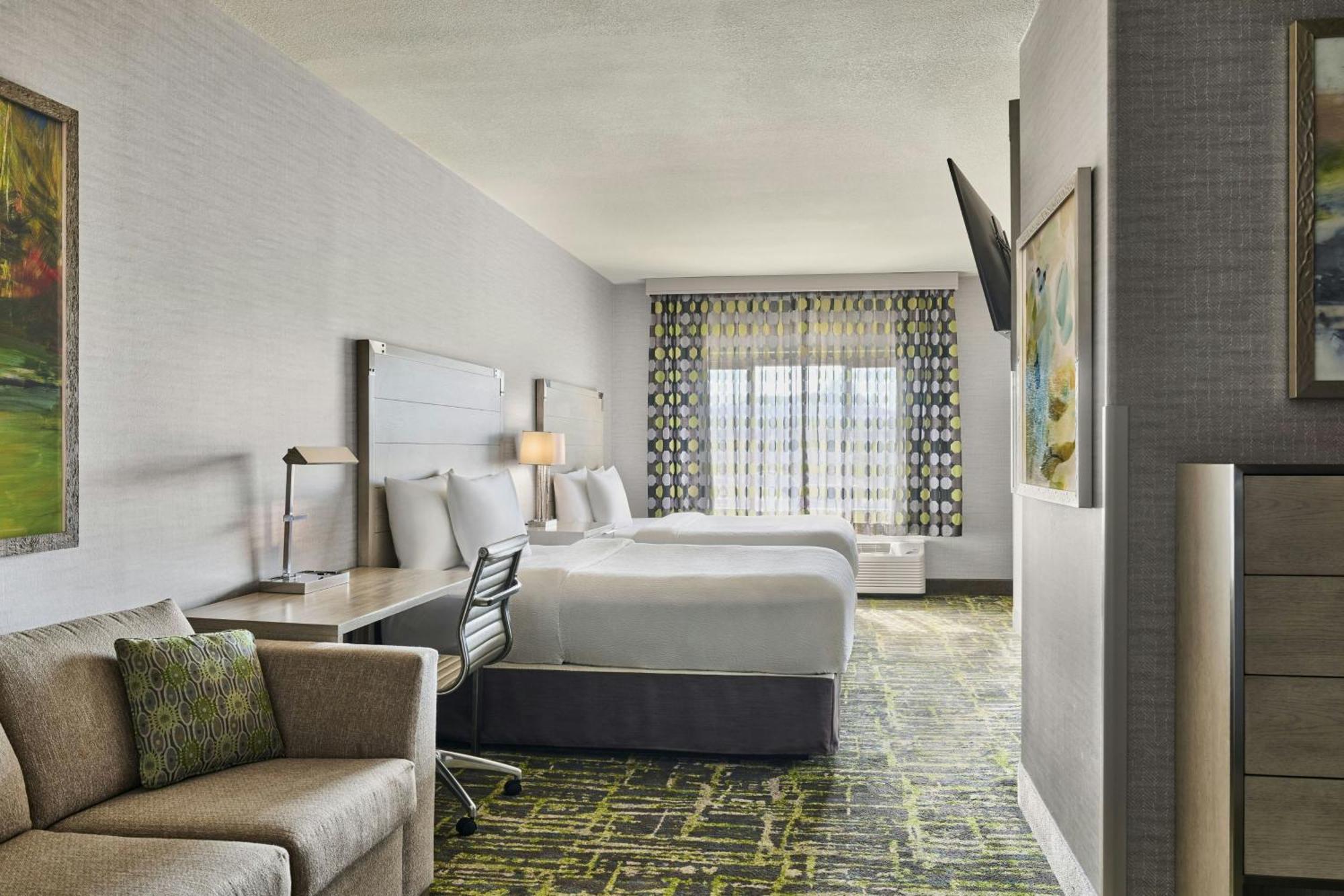 Queen Suite with Two Queen Beds and Sofa Bed